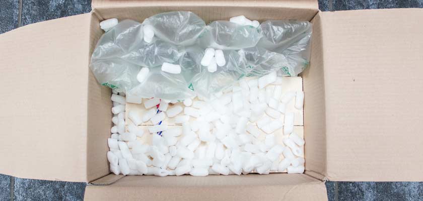 cardboard-box-full-plastic-packaging-material-void-fill